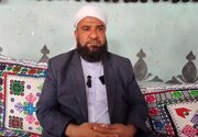 تصویری از پیکر مولوی شهید یوسف گرگیج در تجمع شبانه مردم زاهدان